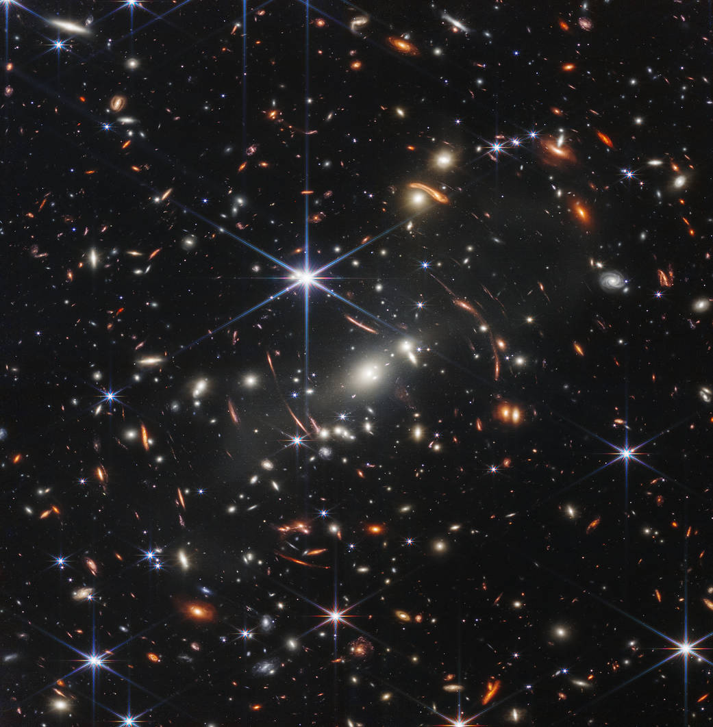 NASA's James Webb
                        Space Telescope's deepest and sharpest infrared 
                        image of the distant universe so far, the galaxy cluster SMACS 0723. SMACS 0723
                        is 4.6 billion light-years from Earth located in the constellation of Volans